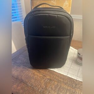 Nomad Lane Ikigai Black Backpack Gunmetal/tan lining. Sold out online.